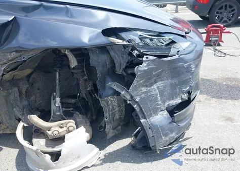 2023 Tesla Model Y Awd/Long Range Dual Motor All-Wheel Drive z USA, uszkodzony, nr VIN 7SAYGDEE8PA145857